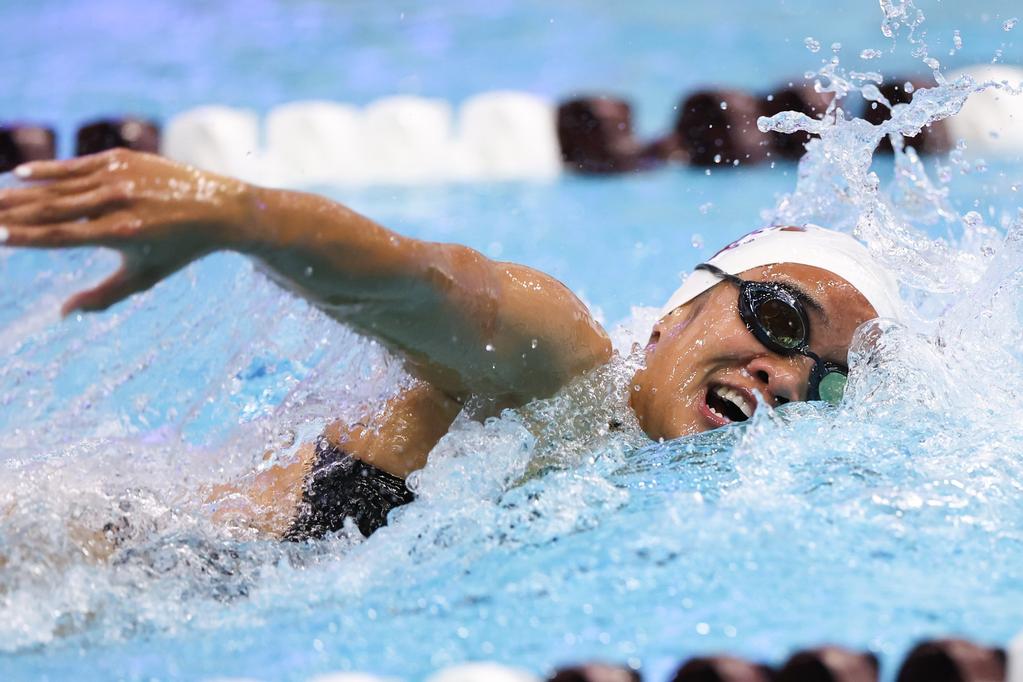 A ϲʹ̳ swimmer comes up for air during a race
